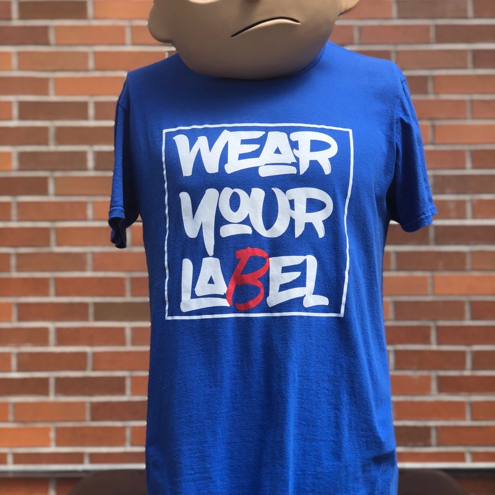 WEAR YOUR LABEL tagline logo Tees
